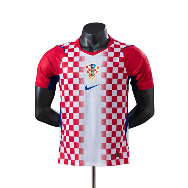 Croatian national soccer jersey with red-and-white checkerboard pattern and crest on the chest, on a mannequin.