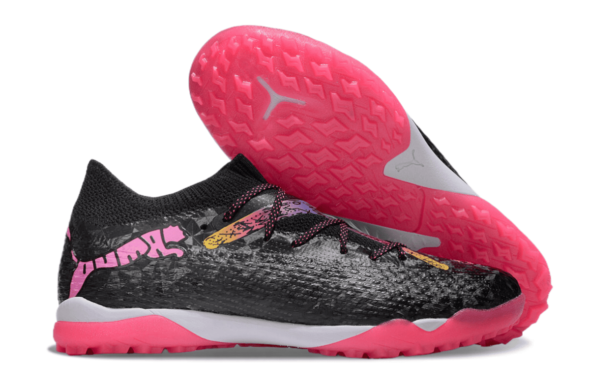 Black athletic shoe with pink outsole and white midsole, featuring pink accents and a textured upper.