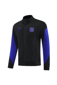 Black zip-front track jacket with royal blue sleeves and Barça crest on the left chest, displayed on a white background.