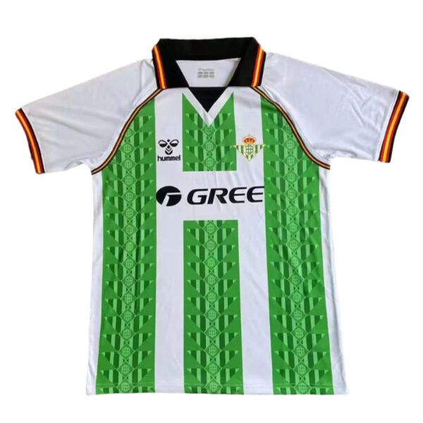 Green-and-white striped football jersey with sponsor logo 'GREE' and club crest, worn by a soccer team uniform.