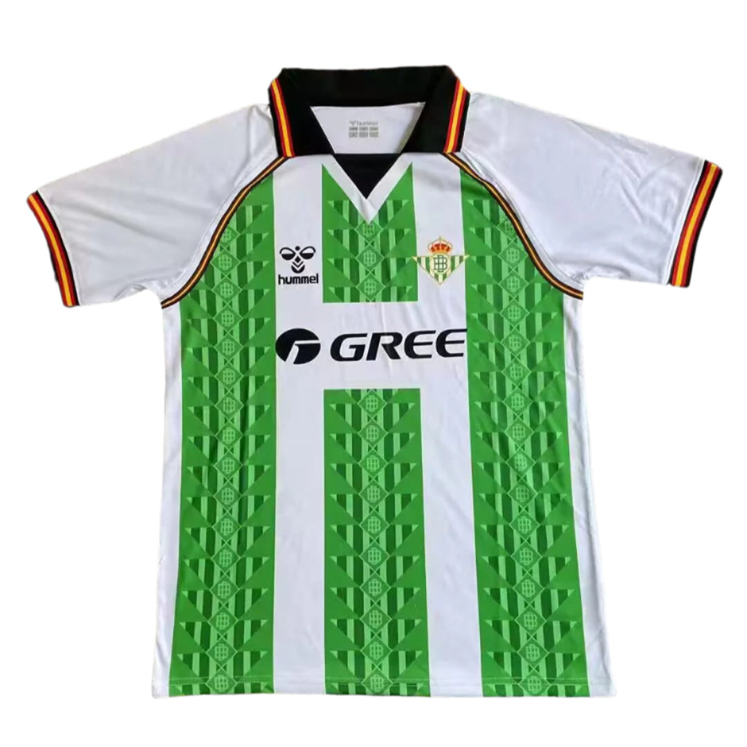 db196f95 Green-and-white striped football jersey with sponsor logo 'GREE' and club crest, worn by a soccer team uniform.