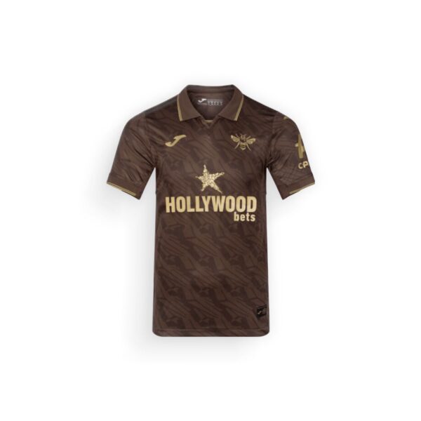 Brown camouflage-pattern polo shirt with gold Hollywood Bets branding, a star graphic, and a bee crest on the chest.