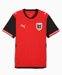 Red soccer jersey with black short sleeves and white Puma logos on the chest and sleeves, left chest crest with shield design.