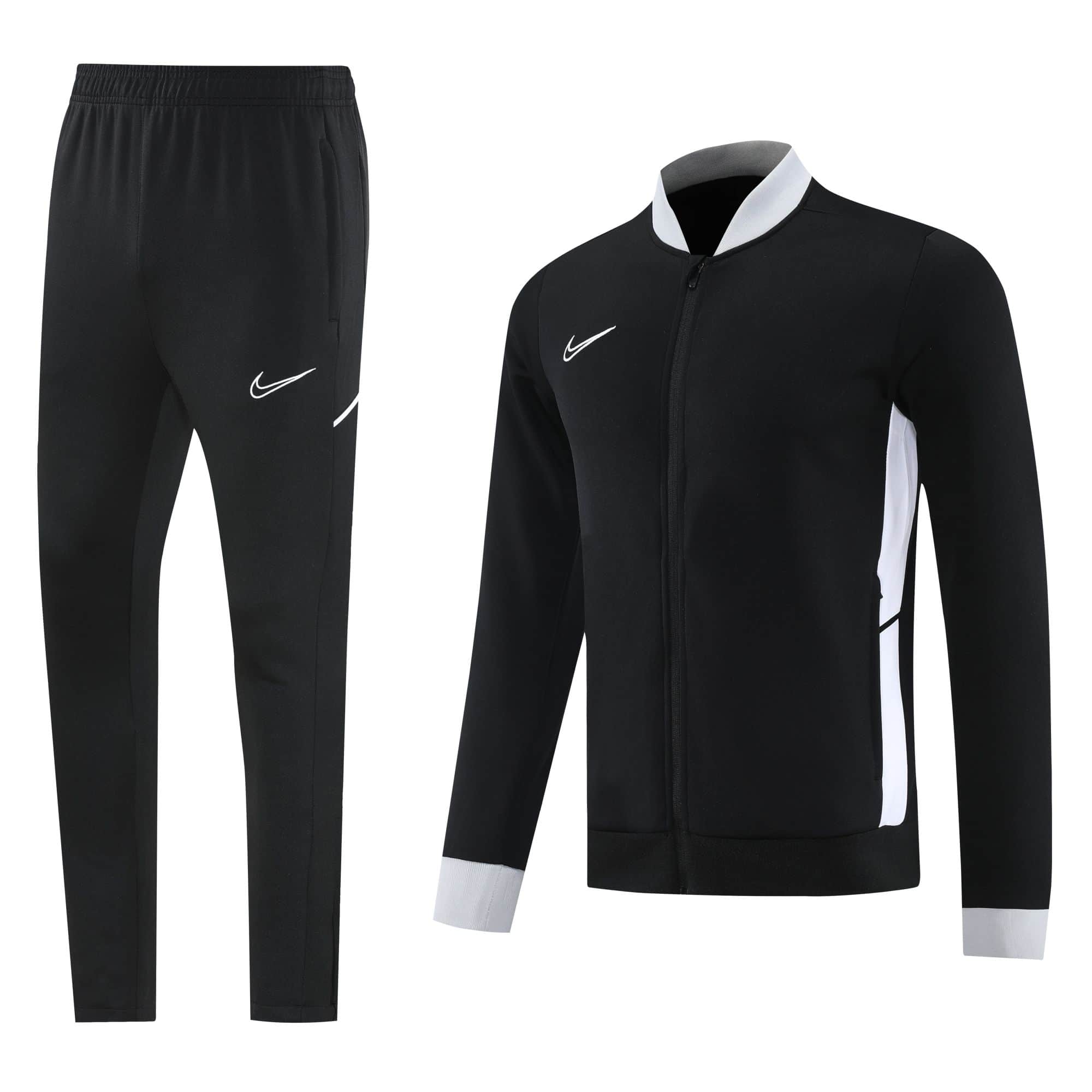 dd168513 | UAE SPORT STORE Black athletic tracksuit set (zip-up jacket and jogger pants) with white Nike swoosh logos on chest and thigh, and white side panels on the jacket and pant cuffs, displayed against a white background.