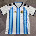 Argentina national soccer jersey with blue vertical stripes on white, Adidas logo, and team crest on the chest