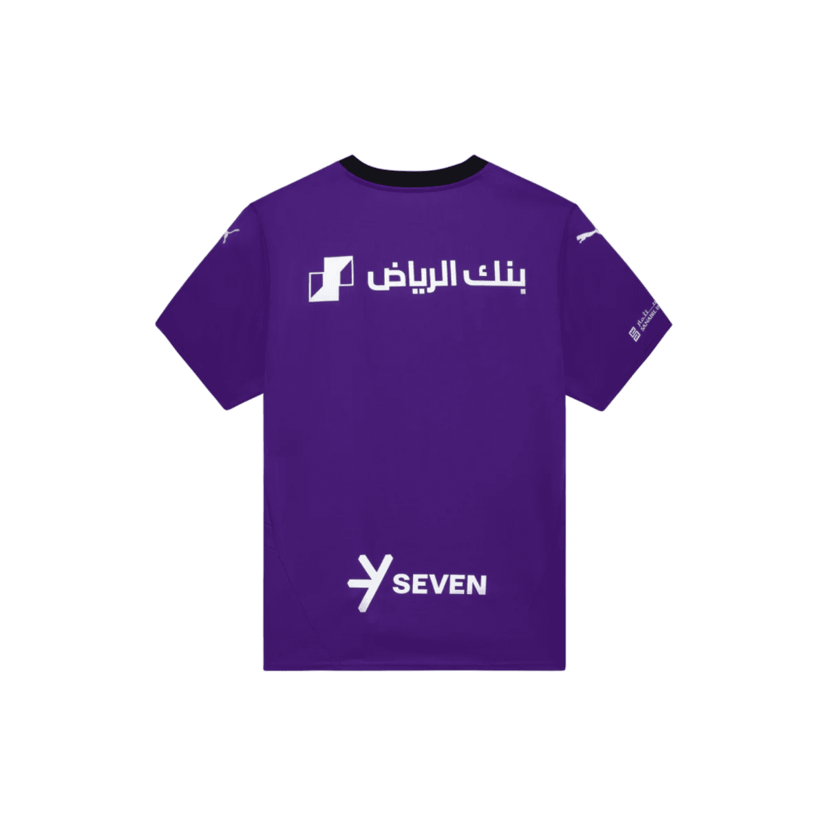 Back view of a purple sports jersey with white logos: Arabic text across the upper back and a 'SEVEN' logo toward the lower back.
