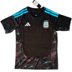 Black Adidas football jersey with light blue shoulder stripes and the Argentina AFA crest on the chest (front view).