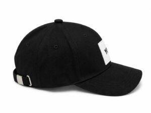 Black streetwear baseball cap with white patch logo.