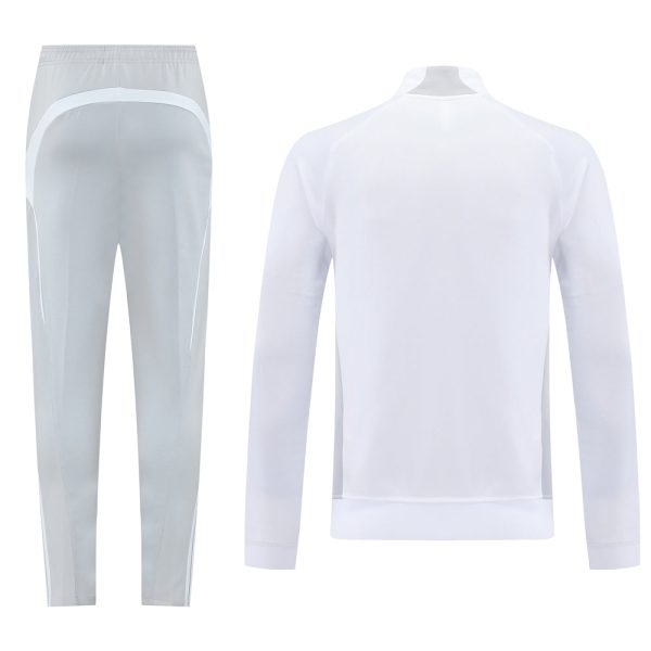 White athletic tracksuit set with a long-sleeve jacket and tapered pants, plain and minimalist design.