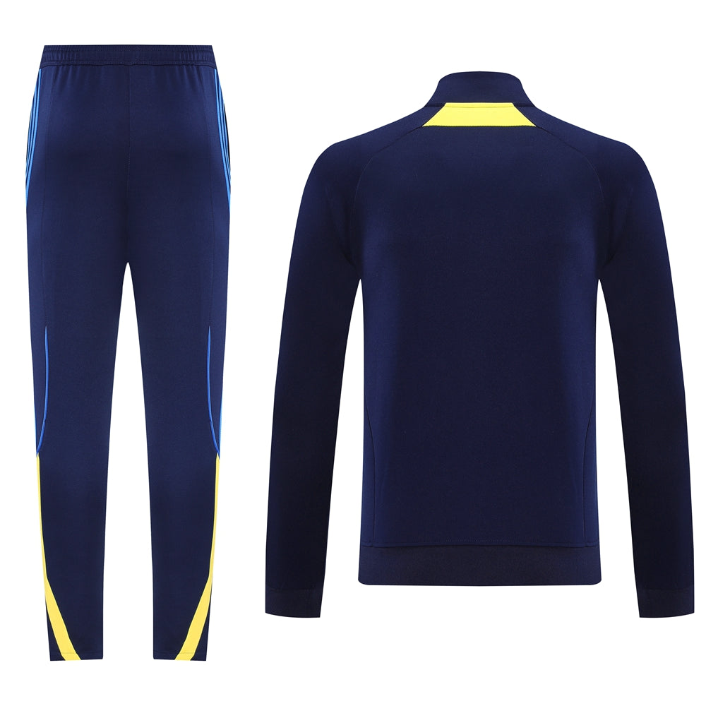 e19fe1a6 | UAE SPORT STORE Navy blue athletic tracksuit with a matching jacket and pants; yellow accents on the jacket neck and on the pant legs.