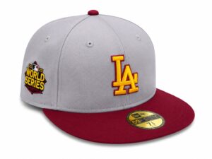 Grey baseball cap with a maroon brim, yellow LA logo on the front, and a 2020 World Series patch on the side.