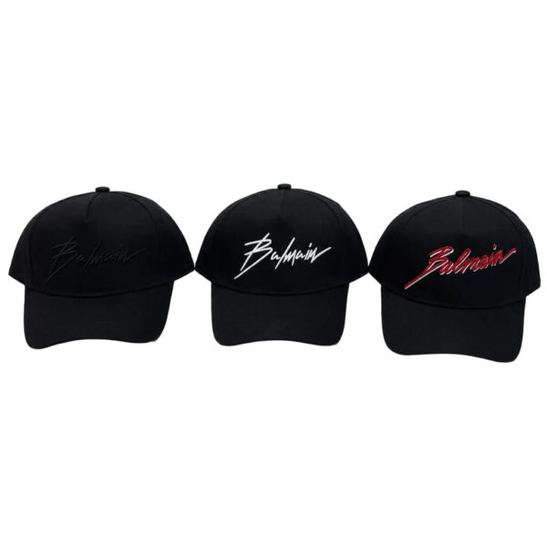 Three black Balmain baseball caps with signature embroidery in gray, white, and red.