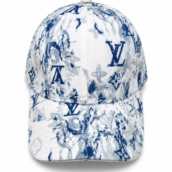 Blue-and-white floral Louis Vuitton cap with LV monogram pattern on a white background, front view.