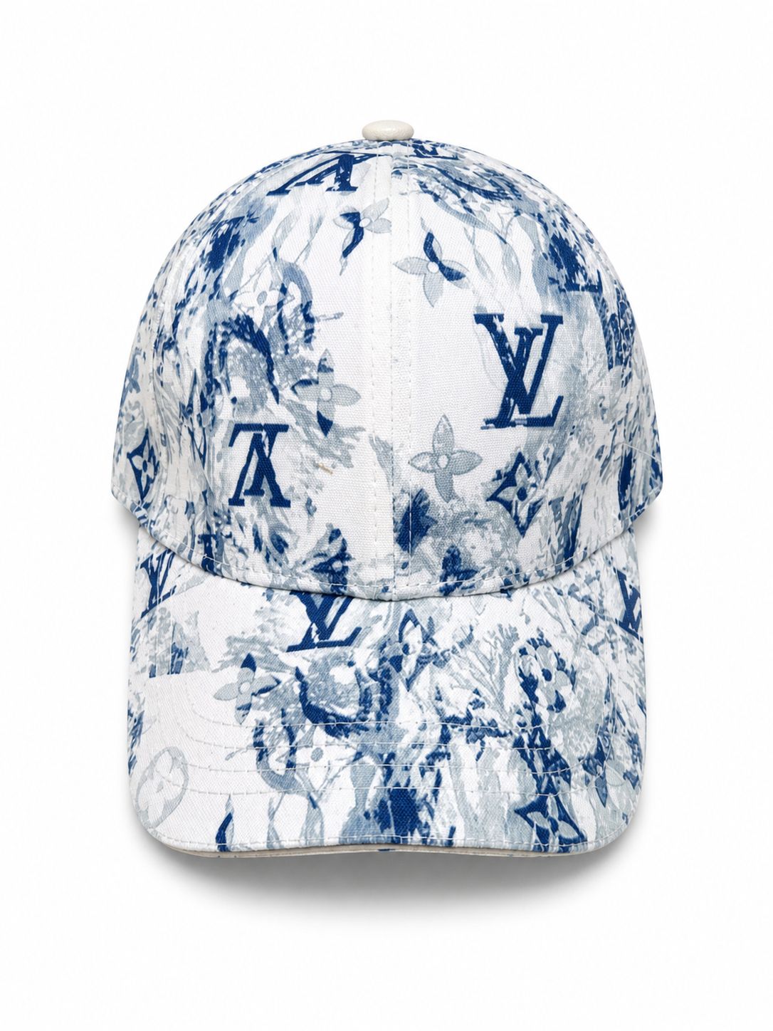e4b446e5-2d3c-4214-879c-e7ad54dc0741 Blue-and-white floral Louis Vuitton cap with LV monogram pattern on a white background, front view.