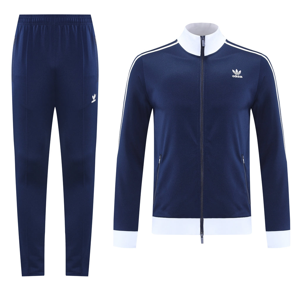 e623d188 Navy Adidas track suit with white cuffs and zip jacket, full-length pants shown separately