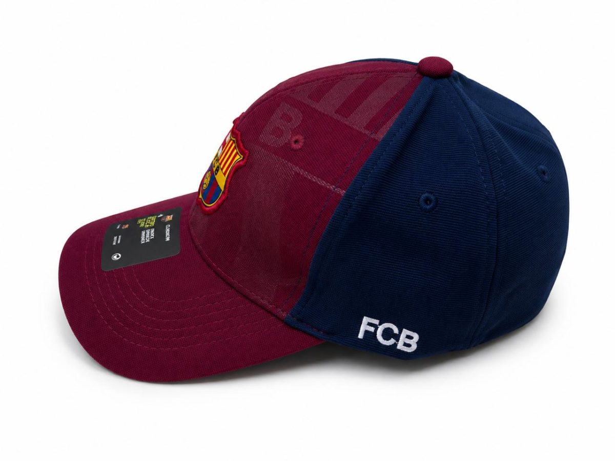 FC Barcelona cap with maroon front and blue back, featuring the club crest on the front and 'FCB' on the side/back.