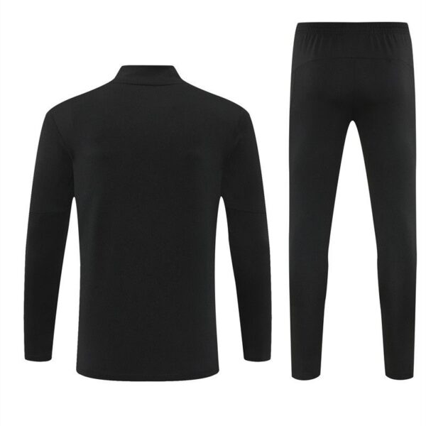 Black athletic tracksuit top and pants set (long-sleeve top with mock neck and slim-fit pants) on white background