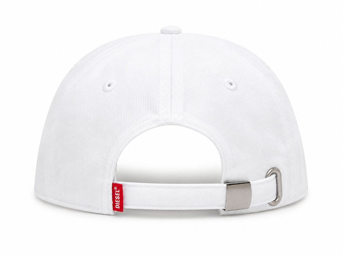 Rear view of a white baseball cap showing an adjustable strap with a metal buckle and a red Diesel brand tag