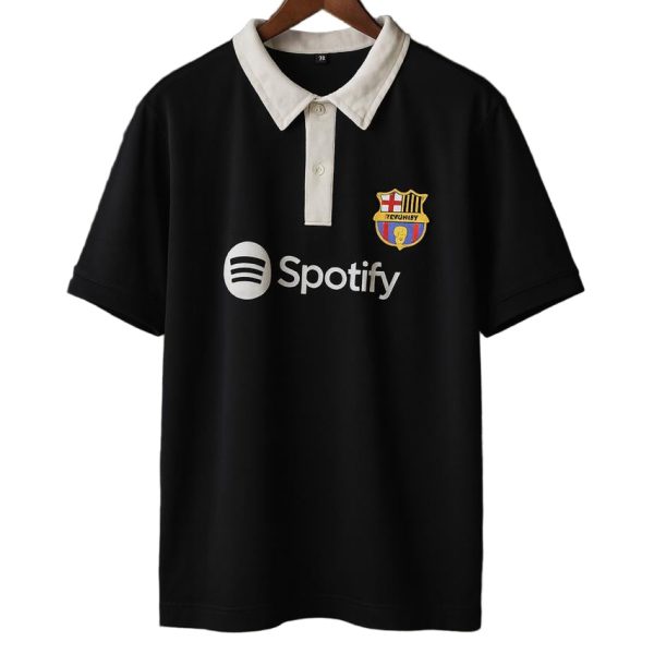 Black polo shirt with a white collar on a wooden hanger, featuring the Spotify logo and FC Barcelona crest on the chest.
