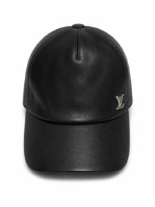 Black leather baseball cap with a small silver LV logo on the side, front view.