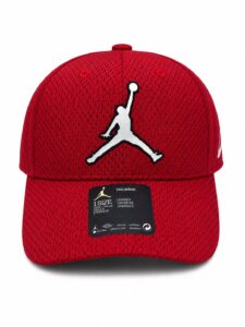 Red mesh baseball cap with a white Jumpman logo centered on the front panel.