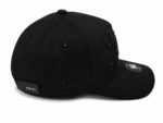 Black vintage script street cap for casual wear and street style.