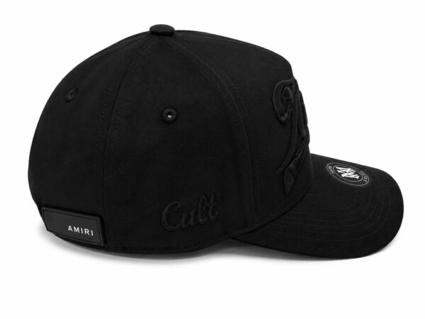 Black vintage script street cap for casual wear and street style.