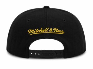 ed41c351-b9d8-474d-a407-9b2b4cd542ee | UAE SPORT STORE Back view of a black snapback cap with a yellow stitched "Mitchell & Ness" logo and an adjustable plastic strap