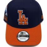 LA Dodgers Sunset Cap with adjustable strap, navy blue and orange design.