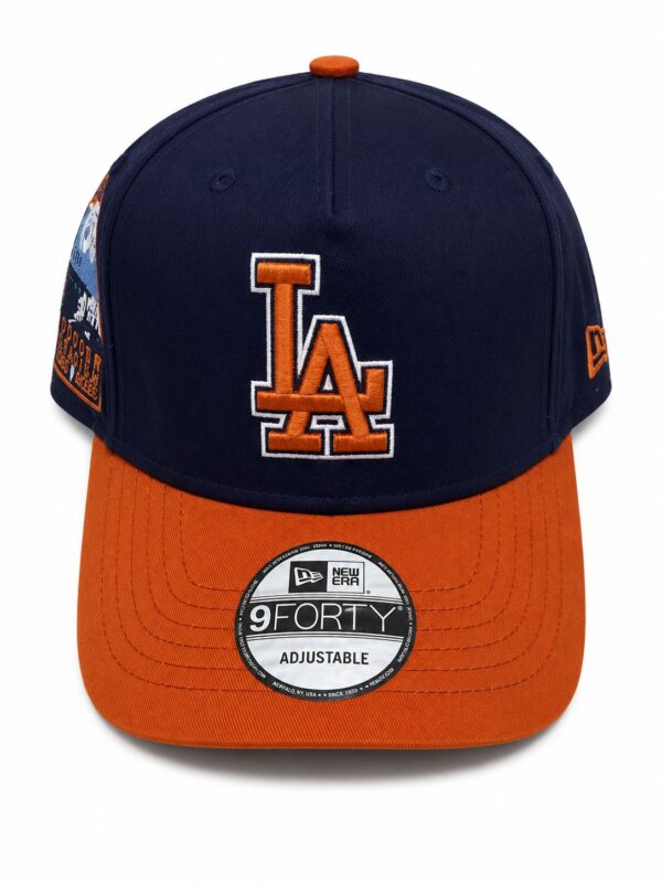 LA Dodgers Sunset Cap with adjustable strap, navy blue and orange design.