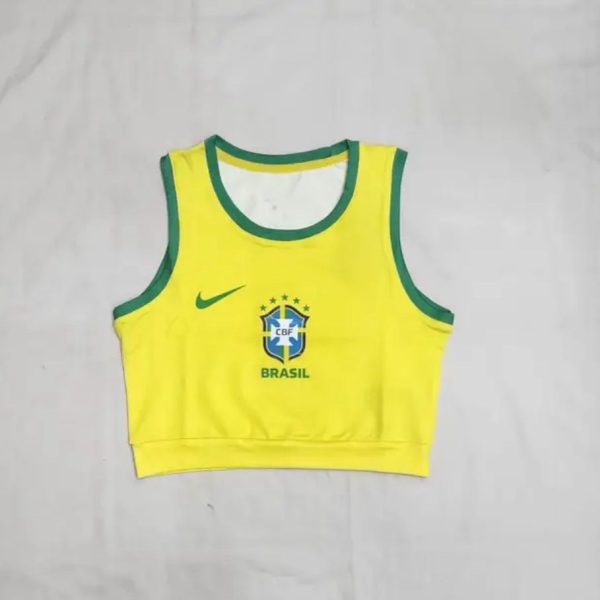 Yellow Brazil crop-top jersey with green trim, featuring the CBF crest, Nike swoosh, and 'BRASIL' text on the front