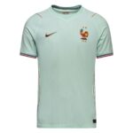 Light mint France national football team jersey with Nike swoosh and FFF crest on the chest, front view.] ,