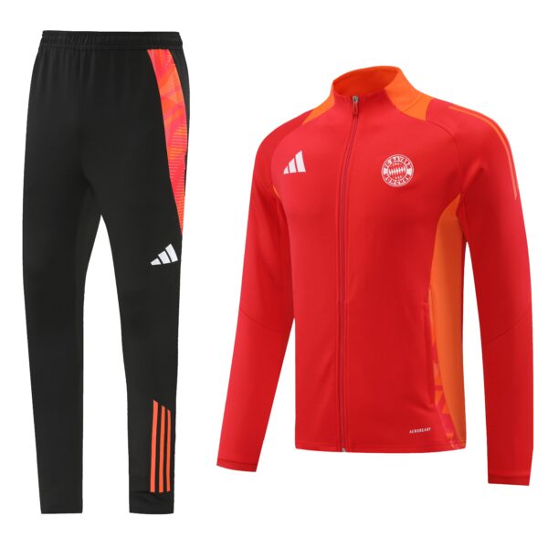 Black athletic pants with orange side stripes shown next to a red training jacket featuring a FC Bayern München crest and orange accents.