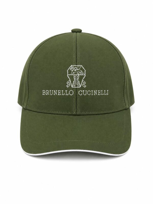 Green baseball cap with white embroidered logo and text.