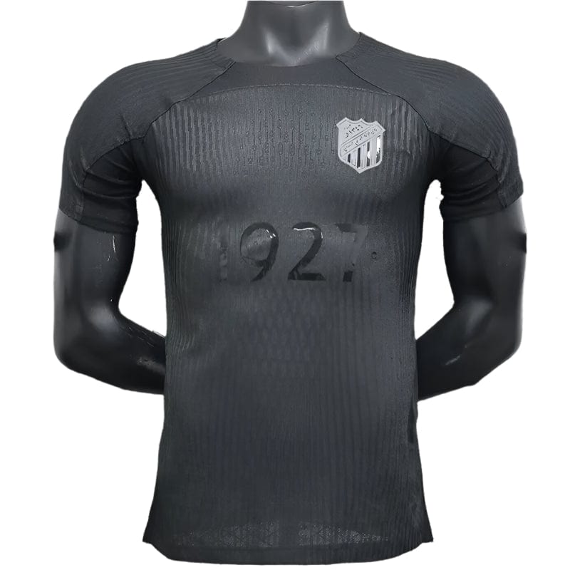 f2c4bd0f-1d78-4984-9176-75ba9ea5630f | UAE SPORT STORE Black training jersey on a mannequin with a silver shield crest on the left chest and the number 92 faded across the front.