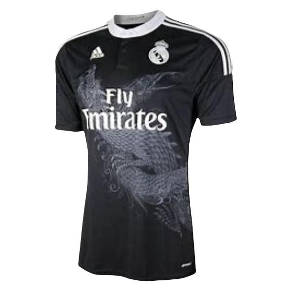 Real Madrid black away jersey with white trim, featuring Fly Emirates sponsor and club crest.
