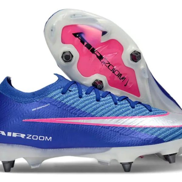 Blue Nike soccer cleat with pink swoosh and exposed pink Zoom Air plate on the sole, white studs visible at the bottom.