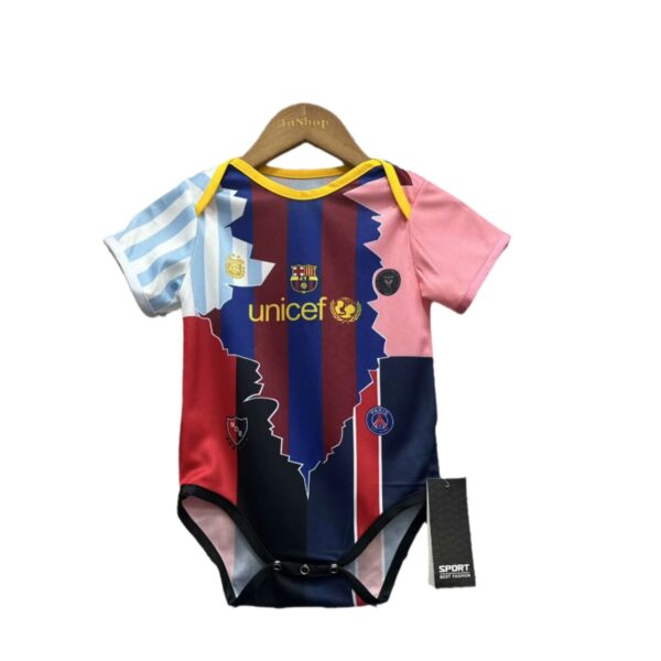 Colorful children's jersey on a hanger with blue and red vertical stripes, pink sleeves, yellow trim, UNICEF logo and small team crests.