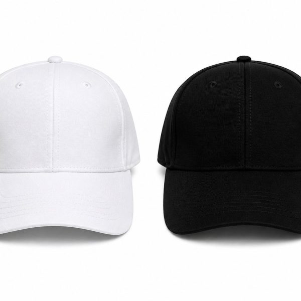 White and black baseball caps shown side by side on a white background, front view with curved bills