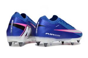 Pair of blue Nike Mercurial soccer cleats with pink accents and white soles on a white background.