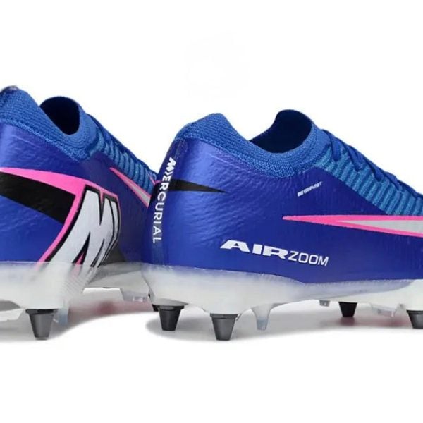 Pair of blue Nike Mercurial soccer cleats with pink accents and white soles on a white background.