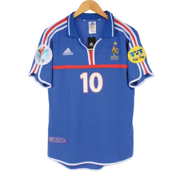 Blue France national team soccer jersey on a wooden hanger, number 10, with Adidas logos and patches on sleeves.