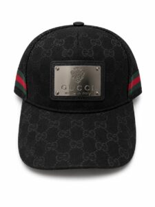 f6258c31-9ace-45f5-babe-1ff2901d6ce1 | UAE SPORT STORE Black Gucci cap with interlocking GG pattern and a silver front plaque reading 'Gucci made in Italy'.
