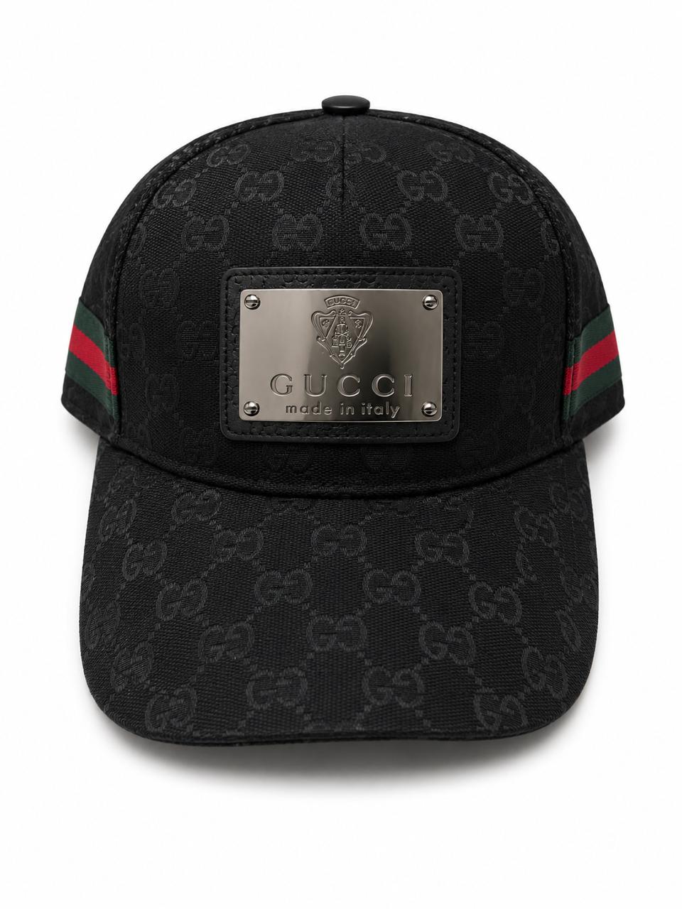 f6258c31-9ace-45f5-babe-1ff2901d6ce1 | UAE SPORT STORE Black Gucci cap with interlocking GG pattern and a silver front plaque reading 'Gucci made in Italy'.