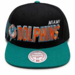 Black Miami Dolphins cap with teal brim, orange-and-teal embroidered team name, and dolphin logo on the side.