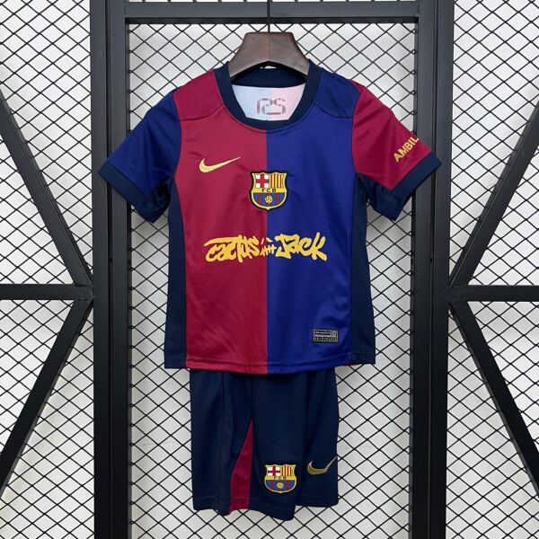 Barcelona soccer jersey hanging on a wooden hanger in front of a metal lattice wall; red and blue vertical halves with the yellow Nike swoosh and FC Barcelona crest on the chest.