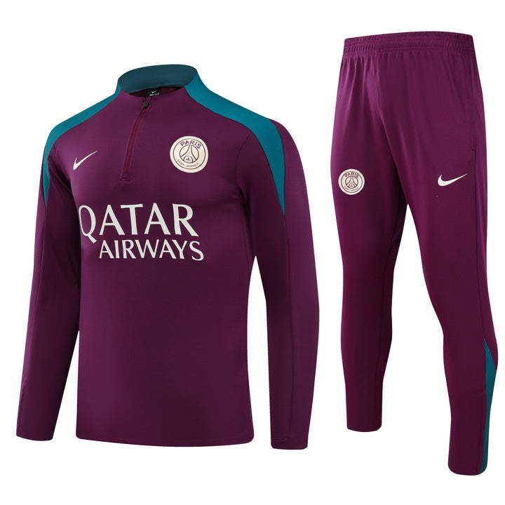 faadd3c7 Paris Saint-Germain training kit: purple jersey with teal shoulder panels and matching pants, sponsor ‘Qatar Airways’ visible on the shirt.