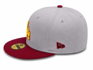 Gray fitted baseball cap with a red brim, yellow stitched 'LA' on the side, and a red New Era logo on the back.
