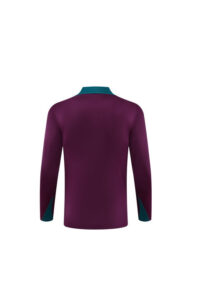 Back view of a purple long-sleeve shirt with teal collar and teal cuff accents.