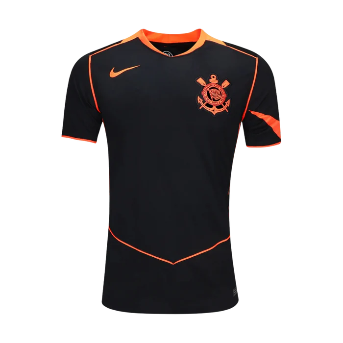 gratidao-instapost-224 | UAE SPORT STORE Front view of a black soccer jersey with orange piping and a crest on the left chest.